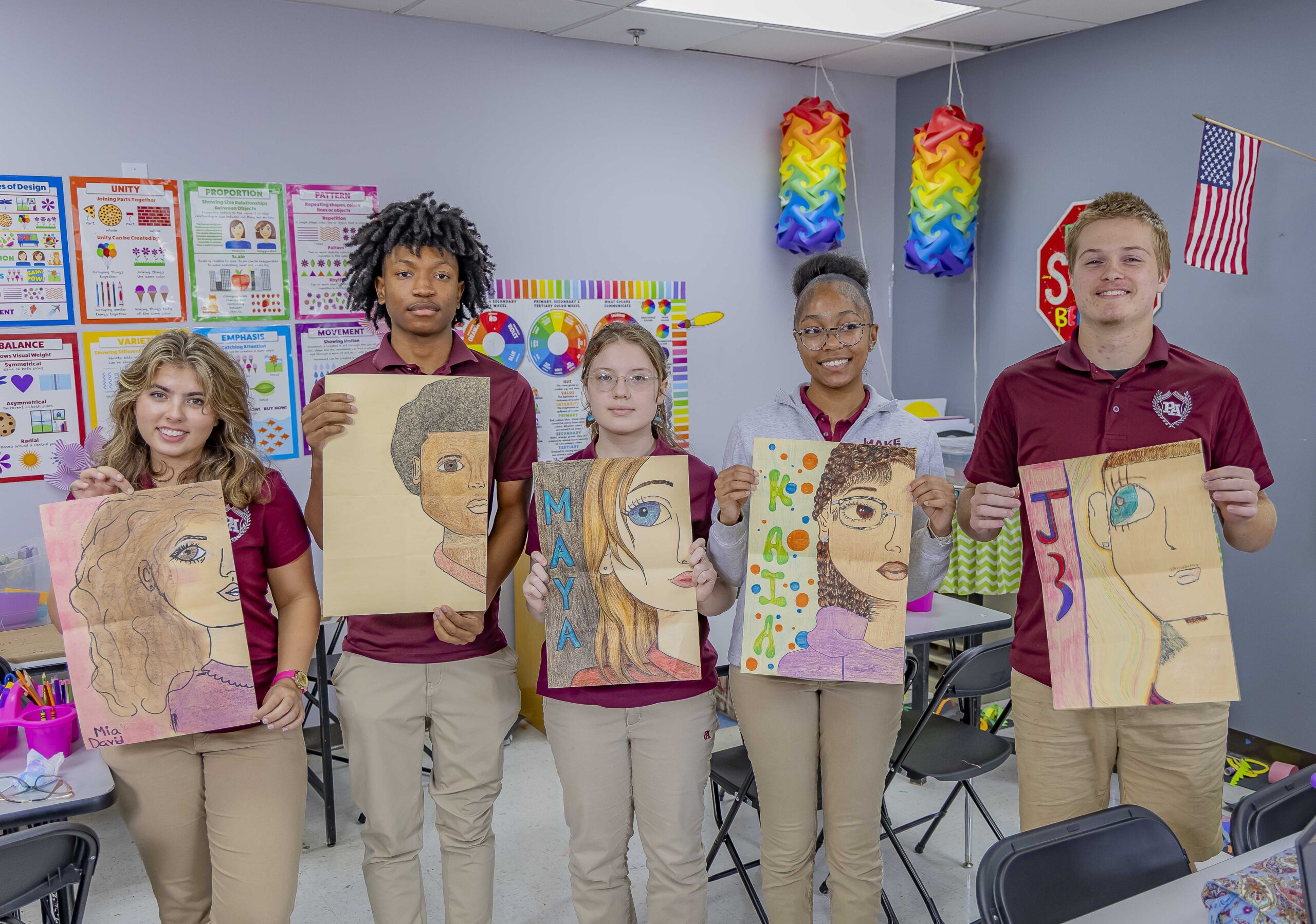 Peachtree Academy students displaying their artwork