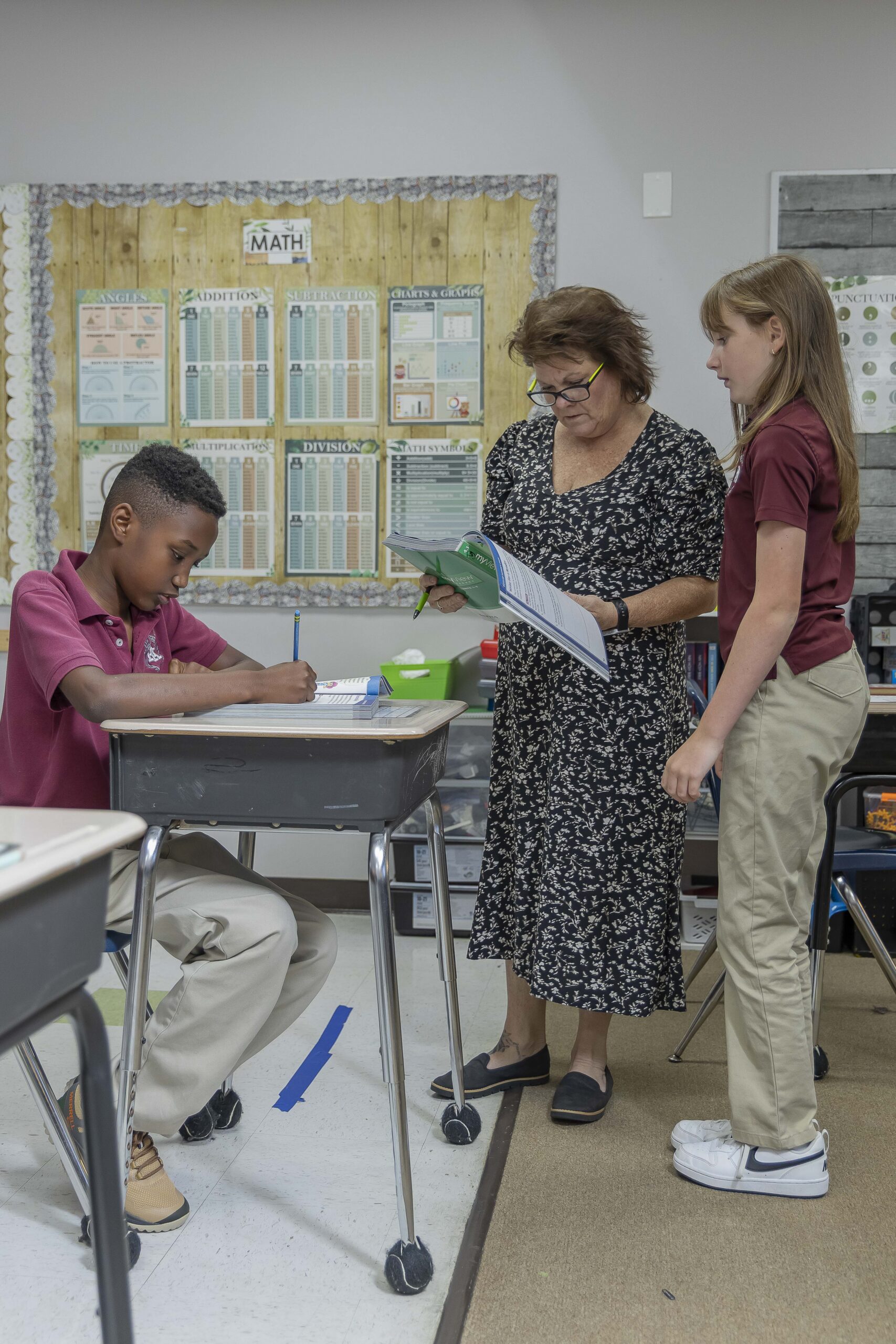 Peachtree Academy teacher supporting elementary students